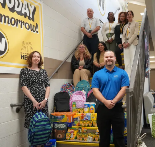 Young professionals group collects school supplies